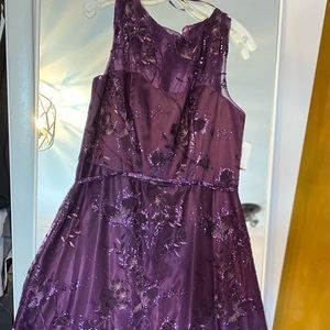 Gorgeous sequins dress beautiful dark purple color! Never worn tags still on!